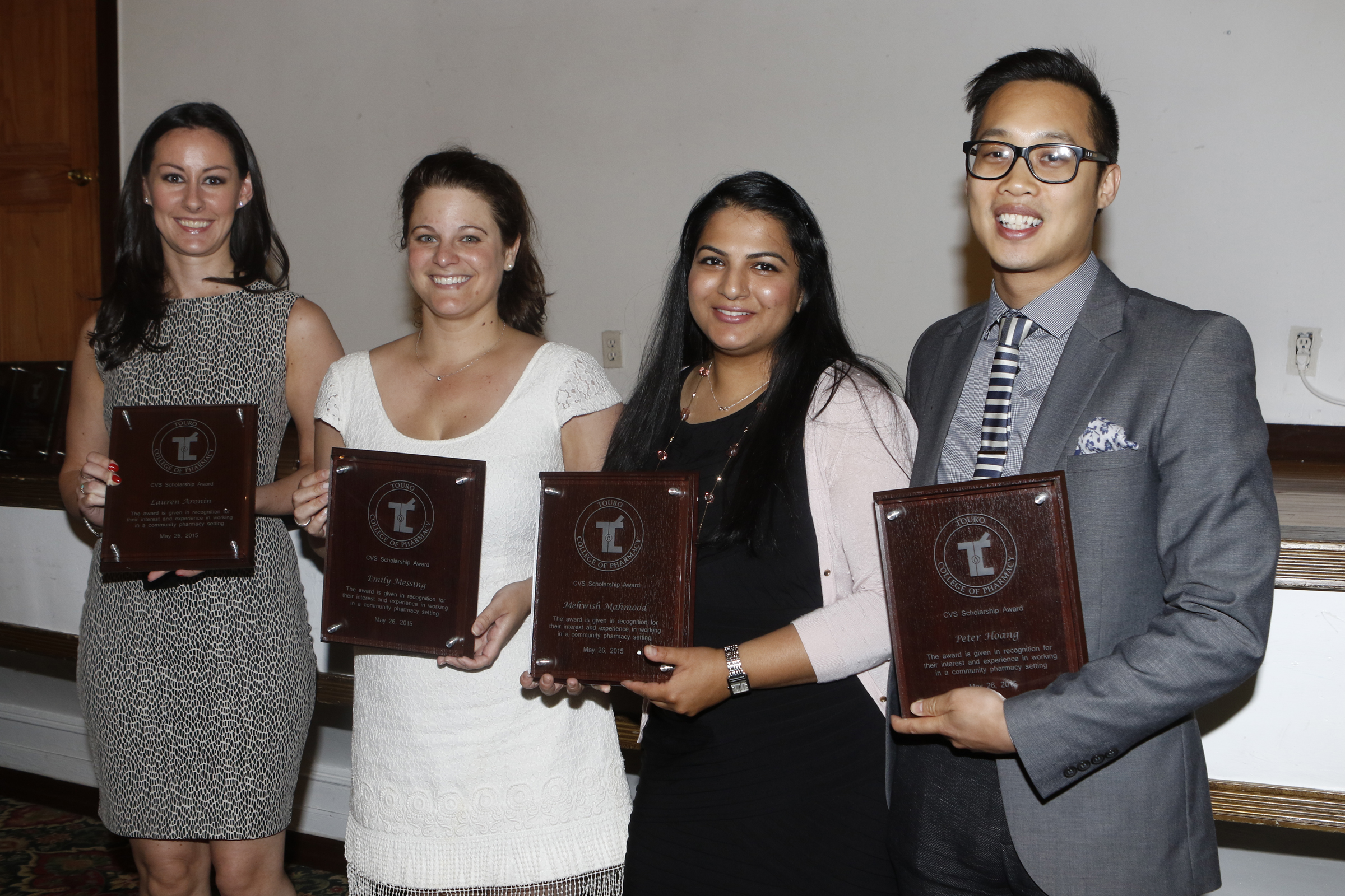 Frpm L-R: Lauren Aronin, Emily Messing, Mehwish Mahmood and Peter Hoang pose with their CVS Scholarship Awards.