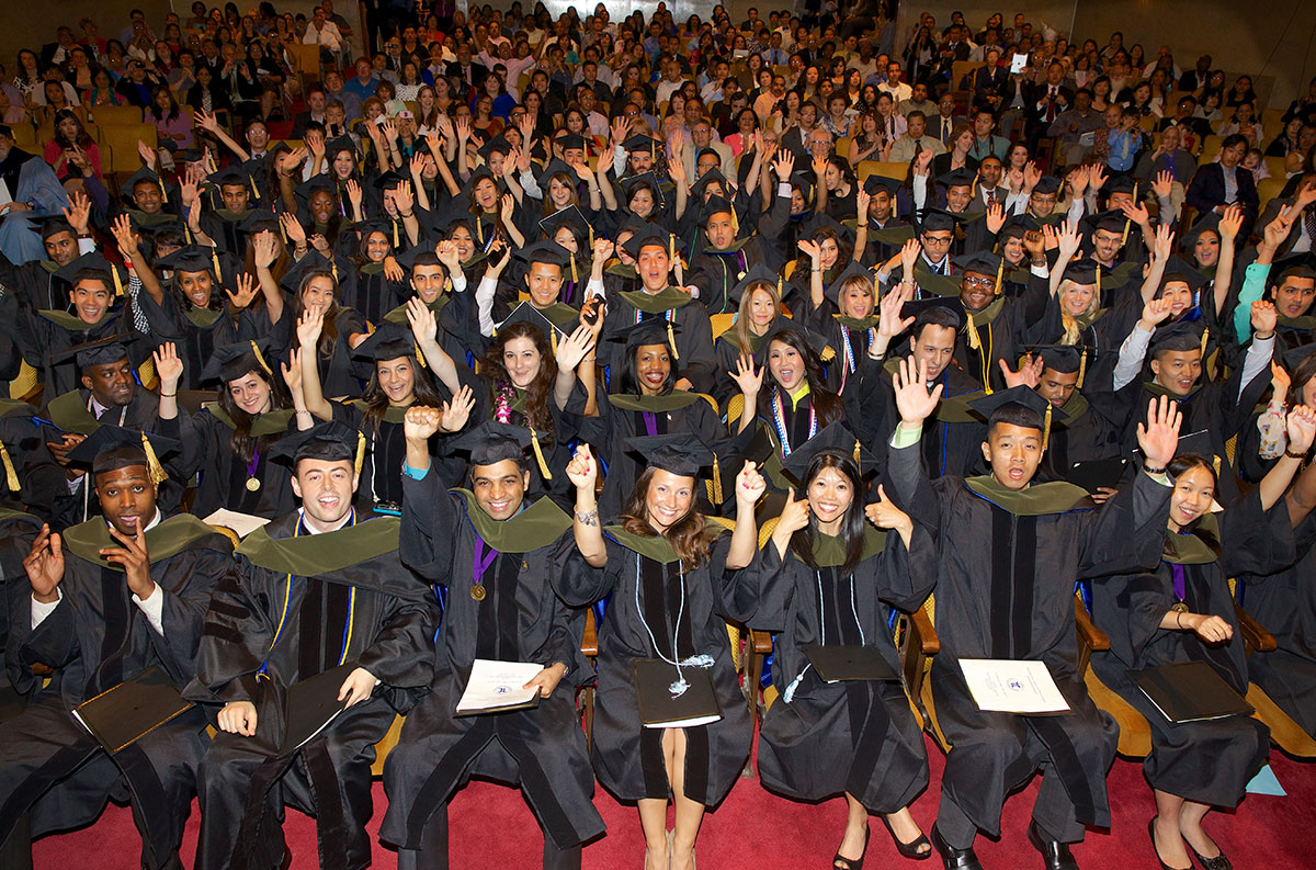 Graduates of the Touro College of Pharmacy Class of 2013 cheering last week at commencement exercises held at The New York Academy of Medicine.  \nPhoto Credit: Amy Hart\n