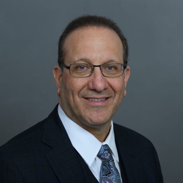 Portrait of Henry Cohen, PharmD, MSc, FCCM, BCPP, BCGP