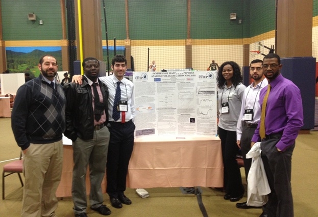 Mohamad Saleh, third from left, with his poster presentation that took second place at the 21st Annual Statewide CSTEP Conference.  \n\n