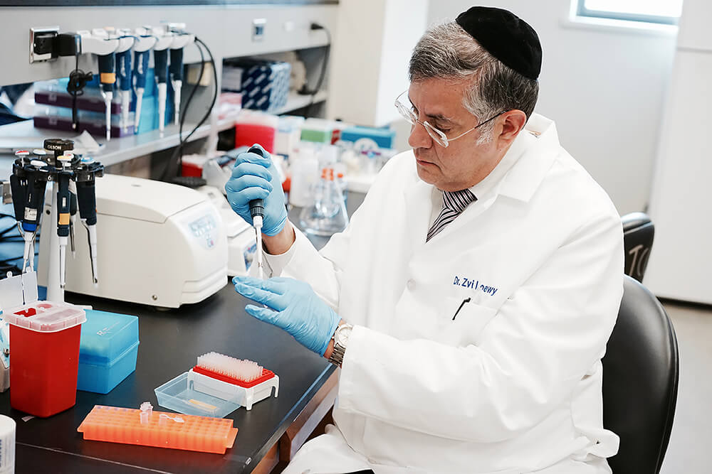 Dr. Zvi Loewy in a lab