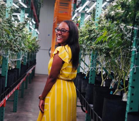 Marla Bowie, PharmD, MPH, in a yellow dress