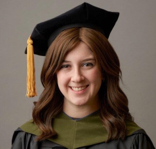headshot of Talia Wall, Touro College of Pharmacy\'s 2021-22 Academic Fellow, in cap and gown