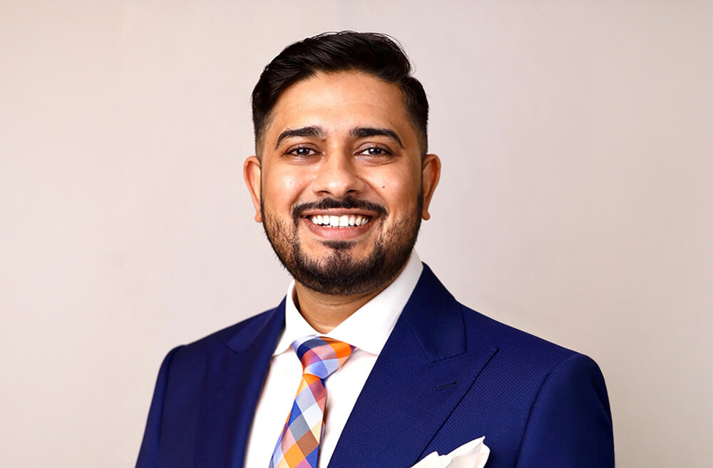 Headshot of Azhar Hussain