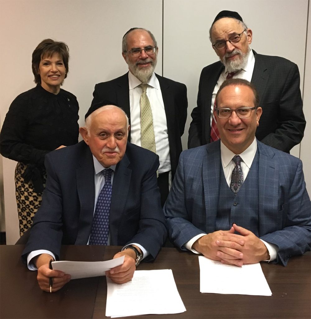 Front L-R, Dr. Robert Goldschmidt, Executive Dean at Lander Flatbush and Dr. Henry Cohen, Dean of Touro College of Pharmacy (TCOP). Back L-R, TCOP Assistant Dean for Admissions and Enrollment Management Heidi Fuchs, Lander Flatbush Dean Henry Abramson, and Touro Vice President of Undergraduate Education Dr. Stanley Boylan.