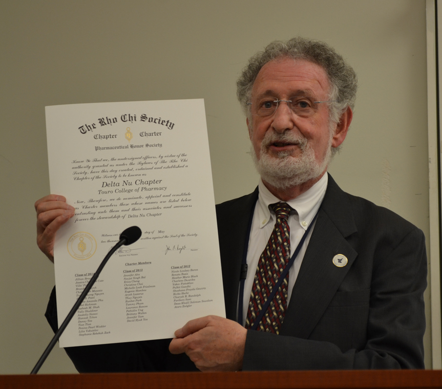 Dean Feldman at the inaugural induction of the Delta Nu chapter to the Rho Chi honor society